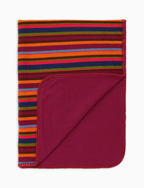 Reversible fuchsia fleece pram blanket with multicoloured stripes and solid colour - Sales -30% | Gallo 1927 - Official Online Shop