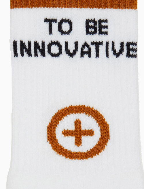 Unisex short white cotton terry cloth socks with "to be innovative" inscription for Gallo pharmacy | Gallo 1927 - Official Online Shop